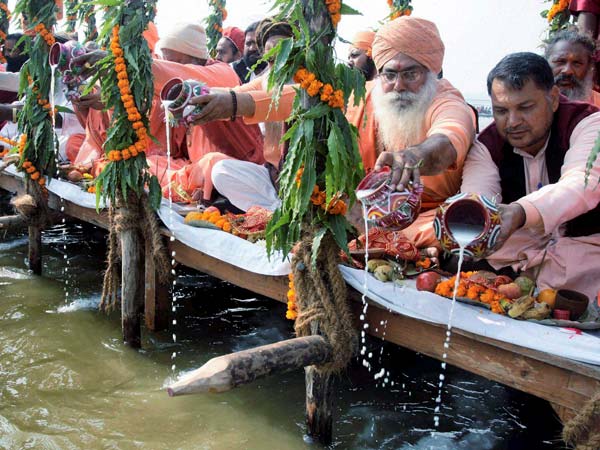 Akhada Sadhus or holy men perform Ganga Puja