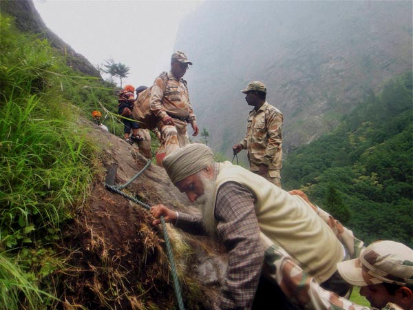 ITBP personnel rescuing stranded pilgrims at flood hit Govindghat