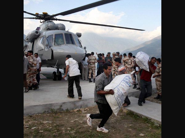 Indian Air Force personnel unloading relief material