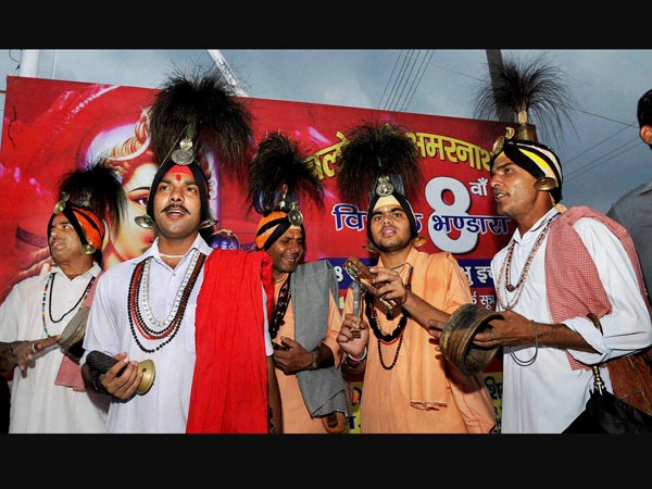Sadhus sing religious songs