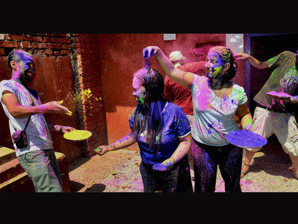 Foreigners celebrate Holi at Bodh Gaya