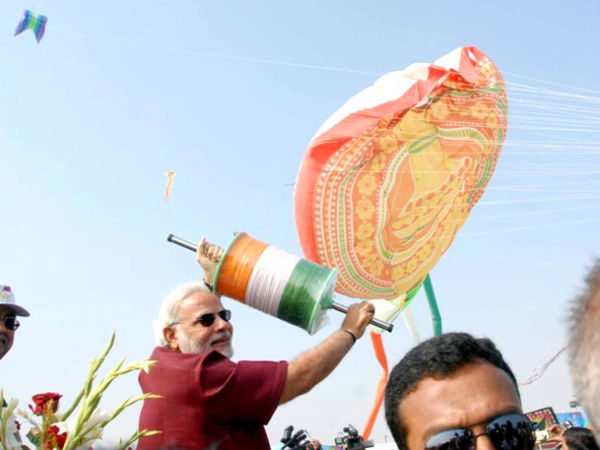Gujarat CM Narendra Modi flies kite