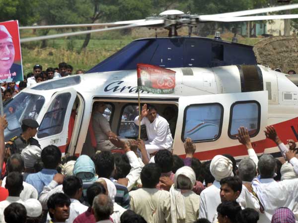 Akhilesh Yadav leaves after attending a rally in Agra