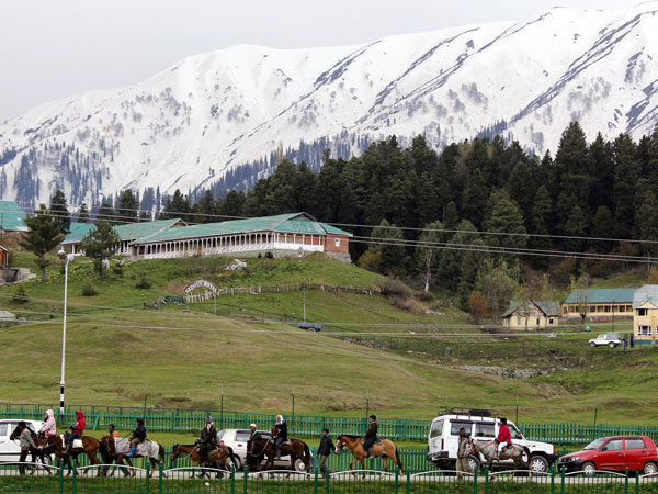 Tourists enjoy themselves in Gulmarg of Jammu and Kashmir