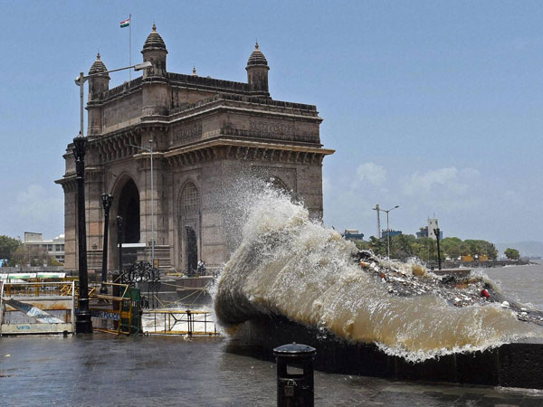 A high tide hits the shore near Gateway of India