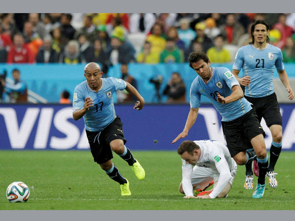 Wayne Rooney takes a hit