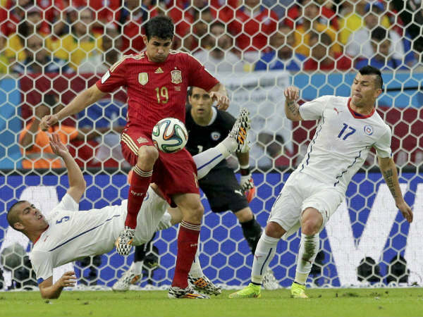 File photo: Diego Costa (red) in action for Spain against Chile File photo: Diego Costa (red) in action for Spain against Chile