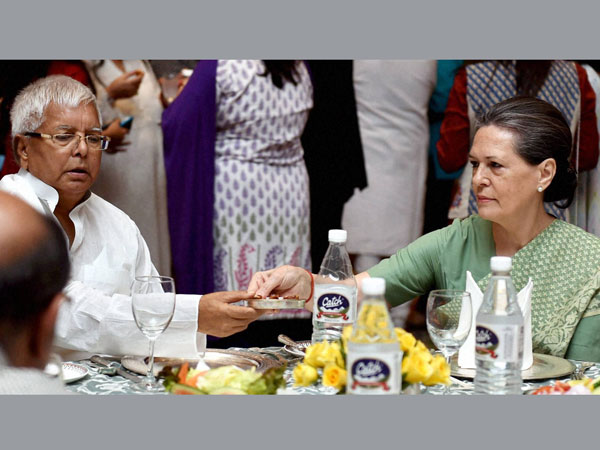 Congress President Sonia Gandhi offer dates to RJD chief Lalu Yadav