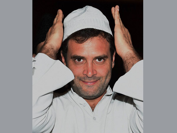 Congress Party Vice president Rahul Gandhi adjusts his cap