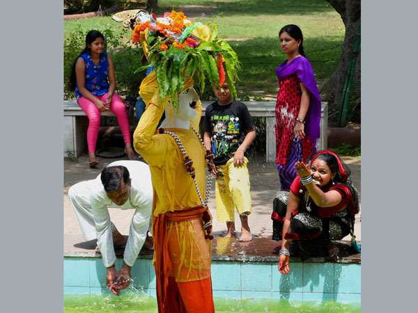 Devotees pay obeisance to Lord Krishna during Janmashtami celebrations