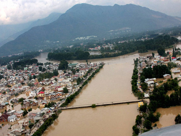 An aerial view shows buildings partially submerged