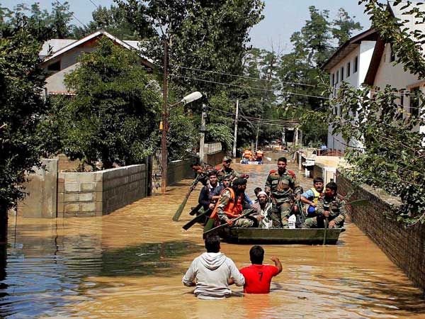 Kashmiri residents use makeshift rafts