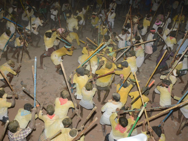 Two groups of villagers fiercely clash