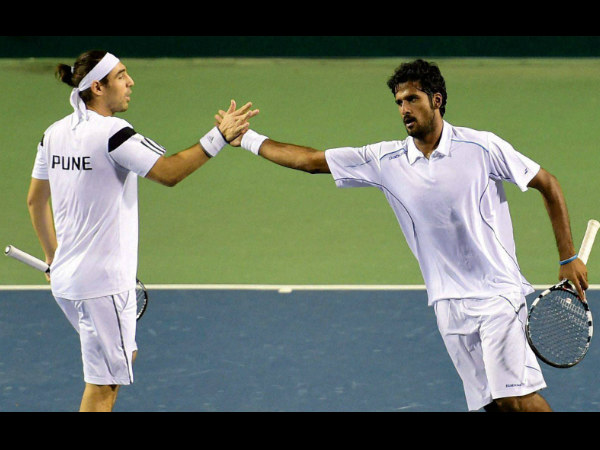 Marcos Baghdatis and Saketh Myneni of Pune Marathas celebrate a point against Feliciano Lopez and Ramkumar Ramanathan of Bangalore Raptors during the Men's Doubles match Marcos Baghdatis and Saketh Myneni of Pune Marathas celebrate a point against Feliciano Lopez and Ramkumar Ramanathan of Bangalore Raptors during the Men's Doubles match