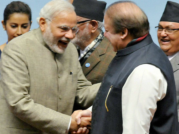 Prime Minister Narendra Modi shakes hands with his Pakistani counterpart Nawaz Sharif at the 18th SAARC Summit in Kathmandu, Nepal on Thursday. Nepal PM Sushil Koirala is also seen. (PTI Photo) Prime Minister Narendra Modi shakes hands with his Pakistani counterpart Nawaz Sharif at the 18th SAARC Summit in Kathmandu, Nepal on Thursday. Nepal PM Sushil Koirala is also seen. (PTI Photo)