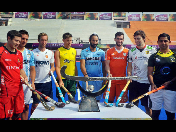 All 8 captains pose with the trophy All 8 captains pose with the trophy