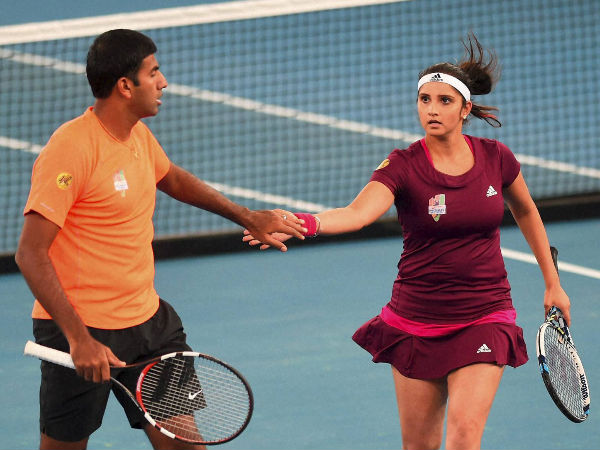 Rohan and Sania during their mixed doubles match Rohan and Sania during their mixed doubles match