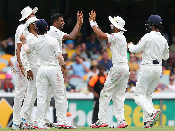 Ashwin is congratulated by teammates after taking the wicket of Watson Ashwin is congratulated by teammates after taking the wicket of Watson
