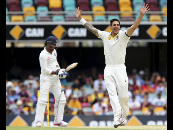 Mitchell Johnson, right, celebrates after he got the wicket of Umesh Yadav Mitchell Johnson, right, celebrates after he got the wicket of Umesh Yadav