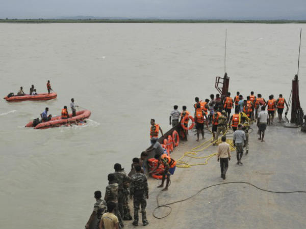 100 feared missing in boat mishap 100 feared missing in boat mishap