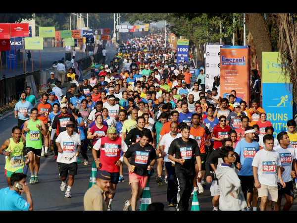 People participate in Standard Chartered marathon in Mumbai on Sunday. People participate in Standard Chartered marathon in Mumbai on Sunday.