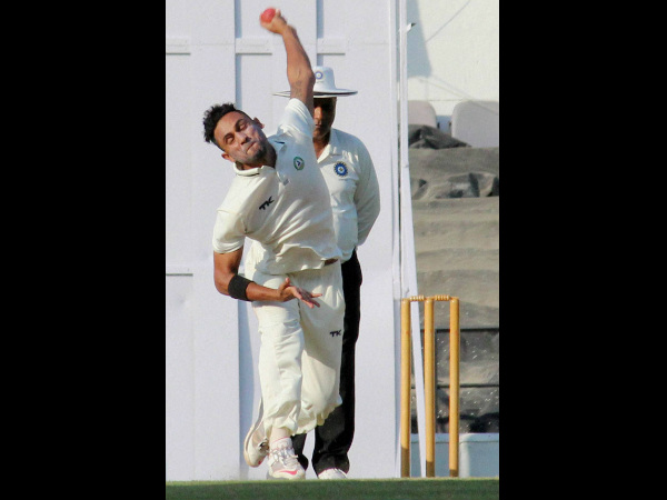 Shrikant Wagh bowls during the match. He took 3 wickets in 2nd innings Shrikant Wagh bowls during the match. He took 3 wickets in 2nd innings