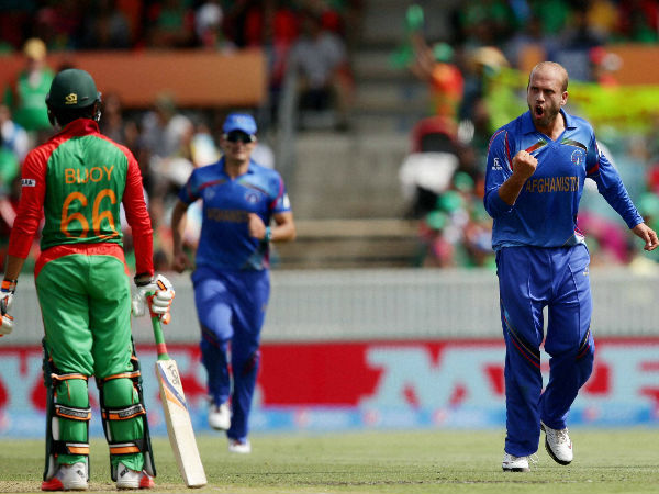 Afghanistan's Mirwais Ashraf, right, celebrates after dismissing Bangladesh’s Haque Anamul Afghanistan's Mirwais Ashraf, right, celebrates after dismissing Bangladesh’s Haque Anamul