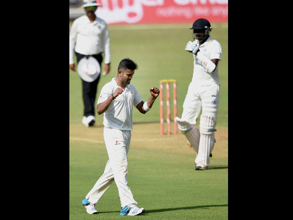 Vinay Kumar (left) celebrates a wicket Vinay Kumar (left) celebrates a wicket