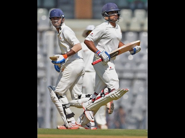 Rahul (left) and Karun run between the wickets during their partnership Rahul (left) and Karun run between the wickets during their partnership