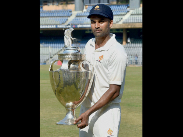 Captain Vinay poses with the trophy Captain Vinay poses with the trophy