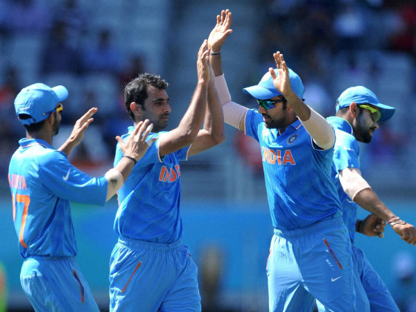 India's Mohammed Shami (centre) is congratulated by teammates after he dismissed one of Zimbabwe's batsman in World Cup 2015 India's Mohammed Shami (centre) is congratulated by teammates after he dismissed one of Zimbabwe's batsman in World Cup 2015