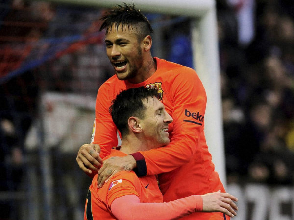 Lionel Messi (left) celebrates his goal with teammate Neymar after scoring against Eibar in La Liga Lionel Messi (left) celebrates his goal with teammate Neymar after scoring against Eibar in La Liga