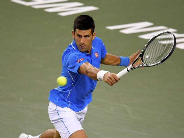 Djokovic in action at BNP Paribas 2015 tennis tournament Djokovic in action at BNP Paribas 2015 tennis tournament