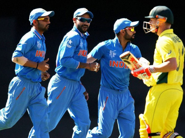 Indian players celebrate an Australian wicket Indian players celebrate an Australian wicket