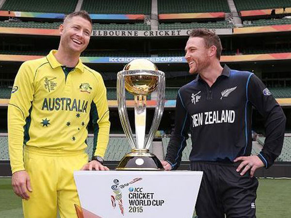 Captains Clarke (left) and McCullum pose in front of the World Cup trophy on Saturday Captains Clarke (left) and McCullum pose in front of the World Cup trophy on Saturday