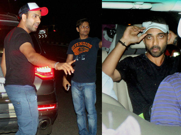 Rohit (left) and Rahane (right) are pictured at the Mumbai airport on Friday night Rohit (left) and Rahane (right) are pictured at the Mumbai airport on Friday night