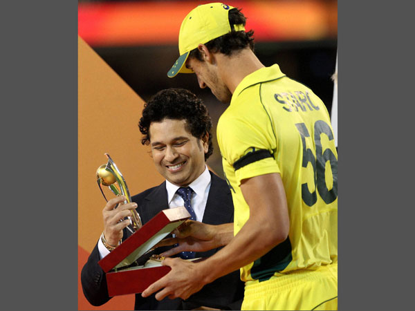 Starc receives Player-of-the-tournament award from Tendulkar Starc receives Player-of-the-tournament award from Tendulkar