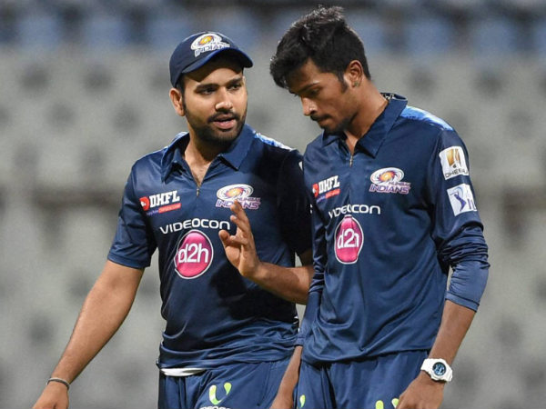 Mumbai Indians captain Rohit Sharma (left) intracts with one of his players Mumbai Indians captain Rohit Sharma (left) intracts with one of his players