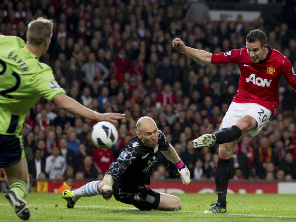 File photo of Robin Van Persie (in red) File photo of Robin Van Persie (in red)