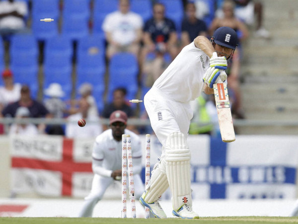 Alistair Cook is bowled by West Indies' Kemar Roach during the opening day of their first cricket Test match in Antigua Alistair Cook is bowled by West Indies' Kemar Roach during the opening day of their first cricket Test match in Antigua