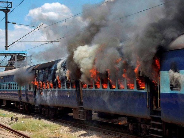 Odisha: Mob sets afire train compartment Odisha: Mob sets afire train compartment