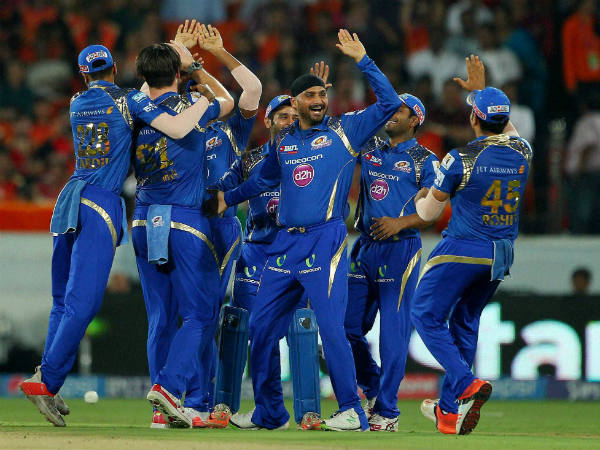 MI players celebrate the wicket of Eoin Morgan MI players celebrate the wicket of Eoin Morgan