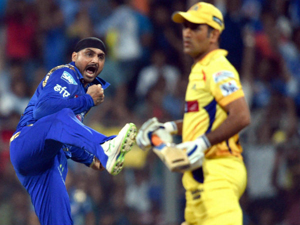 Harbhajan (left) celebrates after dismissing Dhoni for a golden duck Harbhajan (left) celebrates after dismissing Dhoni for a golden duck