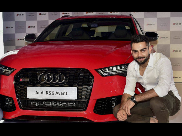Virat Kohli poses with Audi RS6 Avant in New Delhi on Thursday after the launch event. Virat Kohli poses with Audi RS6 Avant in New Delhi on Thursday after the launch event.