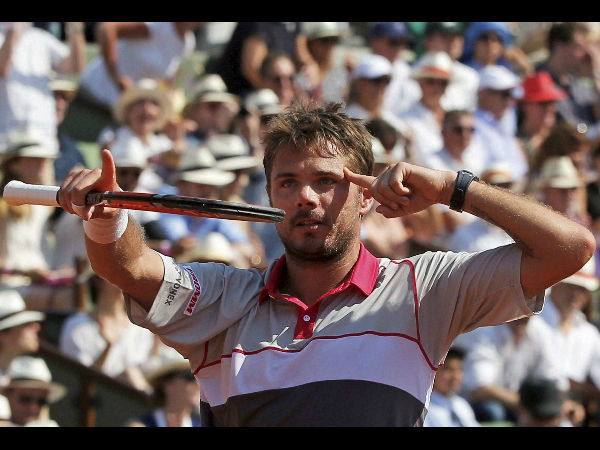 Wawrinka celebrates after winning the semi-final Wawrinka celebrates after winning the semi-final