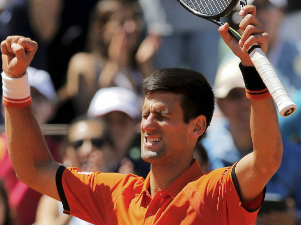 Djokovic celebrates his semi-final win Djokovic celebrates his semi-final win