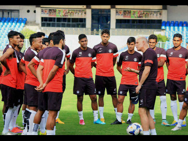 Coach Stephen Constantine talks to Indian players at the Sree Kanteerava Stadium in Bengaluru on Tuesday. Coach Stephen Constantine talks to Indian players at the Sree Kanteerava Stadium in Bengaluru on Tuesday.