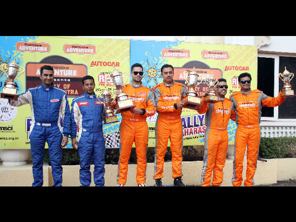 Gaurav Gill (3rd left) and co-driver Musa Sherif (4th left) flanked by second placed Arjun Rao Aroor (extreme left) and Sathish Rajagopal, and third placed Amittrajit Ghosh and Ashwin Naik (right). Gaurav Gill (3rd left) and co-driver Musa Sherif (4th left) flanked by second placed Arjun Rao Aroor (extreme left) and Sathish Rajagopal, and third placed Amittrajit Ghosh and Ashwin Naik (right).
