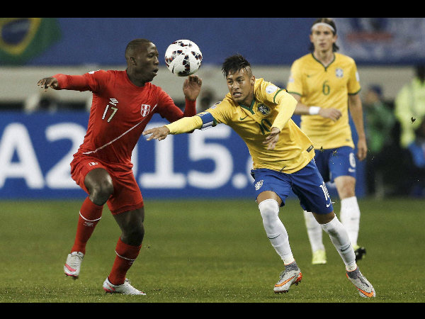 Brazil's Neymar, right, fights for the ball against Peru's Luis Advincula during a Copa America Group C match at the German Becker stadium in Temuco, Chile, on Sunday (June 14) Brazil's Neymar, right, fights for the ball against Peru's Luis Advincula during a Copa America Group C match at the German Becker stadium in Temuco, Chile, on Sunday (June 14)