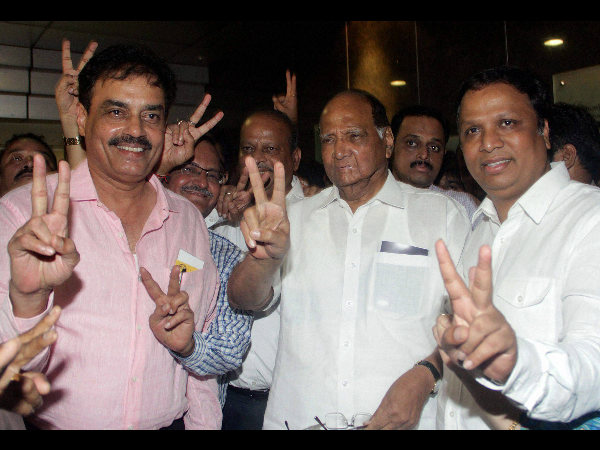 Dilip Vengsarkar, Sharad Pawar and Ashish Shelar celebrate after winning MCA elections in Mumbai on Wednesday. Dilip Vengsarkar, Sharad Pawar and Ashish Shelar celebrate after winning MCA elections in Mumbai on Wednesday.
